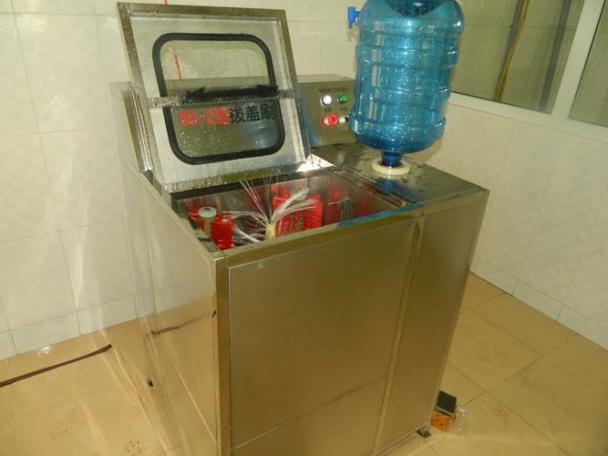 Máy rút nắp cọ rửa bình
